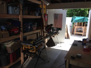 Work table on casters in teh distance, new shelves on the left. Patriotism on display throughout!